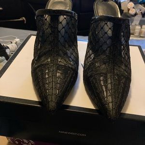 Black patent leather wedge heels with mesh